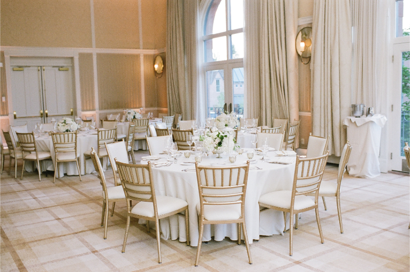 Elegant Boston reception with neutral tones, round tables, and refined details reflecting wedding trends 2026 style