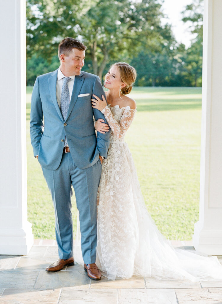 Bride and groom walking outdoors in Boston, elegant attire reflecting wedding trends 2026 style
